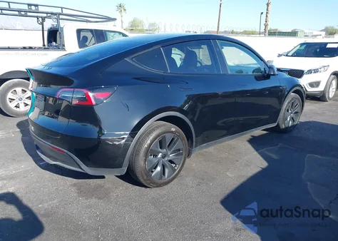 2025 Tesla Model Y from USA, damaged, VIN 7SAYGDED1SF217131